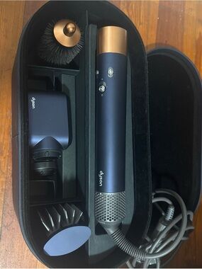 Dyson navy and gold hair styling wand with attachments